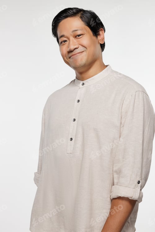 Preview: Three Quarter Length Shot Of Chinese Man In His 30S Smiling And Posing On White Background