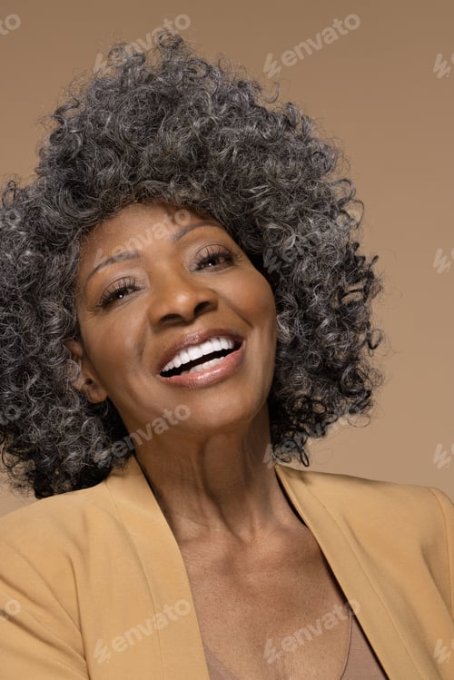 Preview: Close-Up Portrait Of Beautiful Black Woman Of Brazilian Decent In Her 70S Smiling Confidently With
