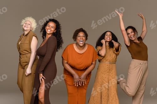 Preview: Studio Portrait Of A Group Of Beautiful Multiracial Women Happily Expressing Themselves On A