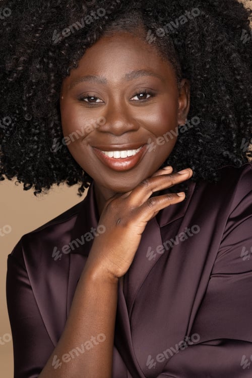 Preview: Portrait Of A Gorgeous African American Woman In Her 20'S With Mild Hyperpigmentation Smiling On A
