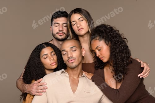 Preview: Portrait Of A Group Of Beautiful Multiracial People With Their Eyes Closed On A Neutral Background.