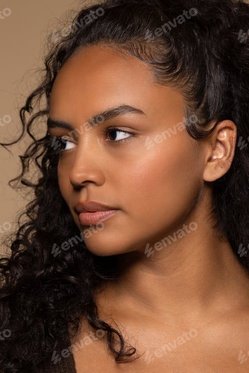 Preview: Close Up Portrait Of Beautiful Hispanic Woman In Her 20S Posing On Neutral Background