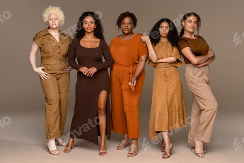 Preview: Full Length Shot Of A Group Of Beautiful Multiracial Women Posing Confidently On A Neutral