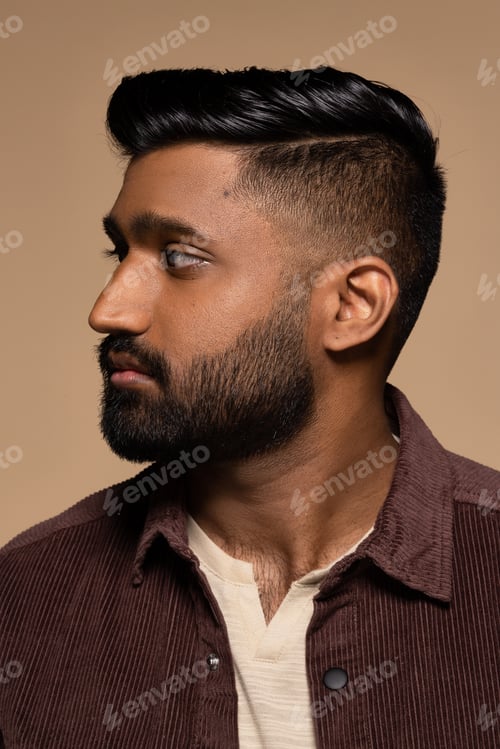 Preview: Portrait Of Attractive Sri Lanken Man In His 20S Looking To The Side With Beautiful Hairstyle On