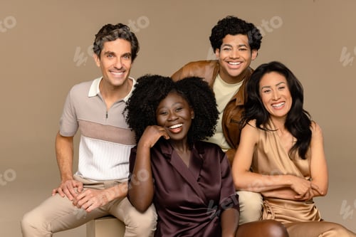 Preview: Studio Shot Of A Group Of Beautiful Multiracial People Smiling Together On A Neutral Background.