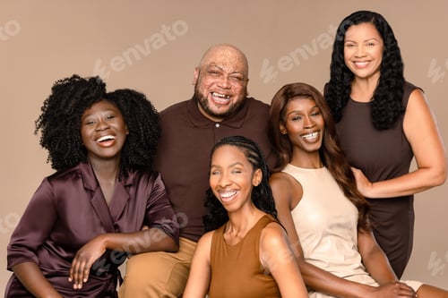 Preview: Portrait Of A Group Of Beautiful Multiracial People Laughing With Each Other On A Neutral