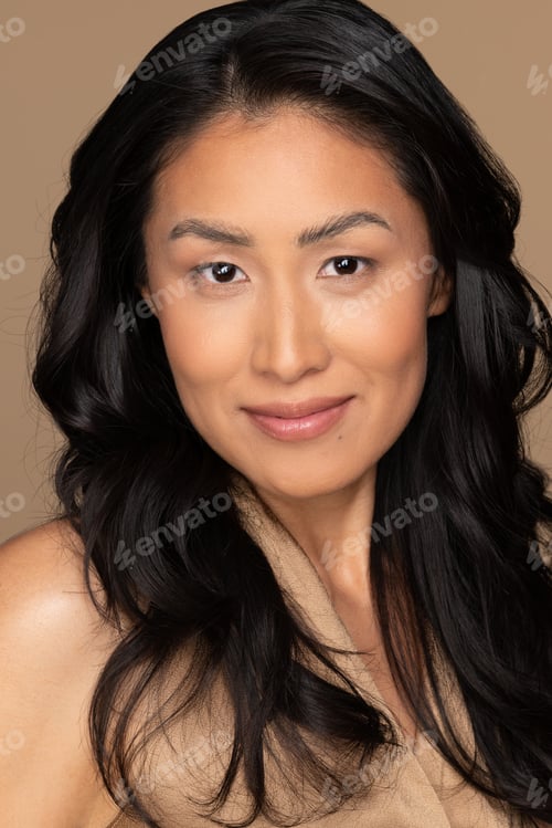 Preview: Portrait Of Beautiful Young Japanese Woman In Her 30S Smiling On Neutral Background