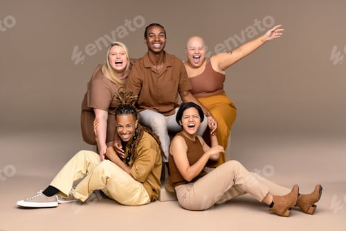 Preview: Portrait Of A Multiracial Group Of People Laughing On A Neutral Background.