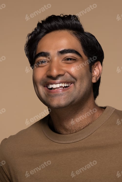 Preview: Portrait Of Attractive Southeast Asian Man In His 20S Posing On Neutral Background