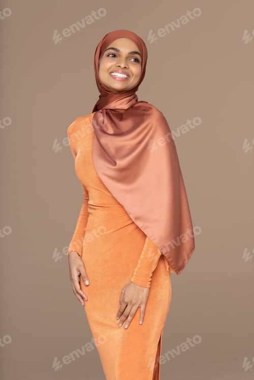 Preview: Three Quarter Shot Of Beautiful South Asian Woman In Her 20S Wearing A Hijab Posing Confidently On