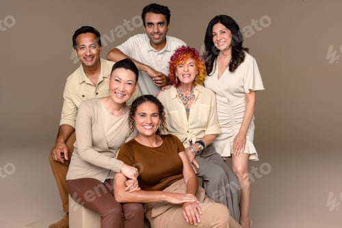 Preview: Portrait Of A Group Of Beautiful Multiracial People Smiling On A Neutral Background.