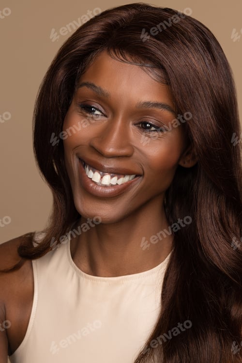 Preview: Profile Of A Beautiful Multiracial Woman In Her 30'S Smiling On A Neutral Background.