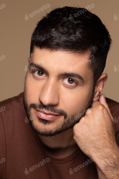 Preview: Portrait Of Attractive Hispanic Man In His 30S Posing Confidently On Neutral Background