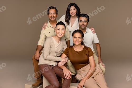 Preview: Studio Portrait Of A Multiracial Group Of People Smiling At The Camera On A Neutral Background.