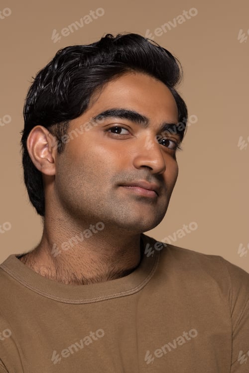 Preview: Portrait Of Attractive Southeast Asian Man In His 20S Posing On Neutral Background