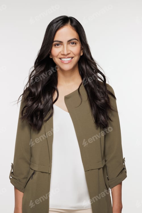 Preview: Three Quarter Length Shot Of Beautiful North Indian Woman In Her 30S Smiling And Posing On White