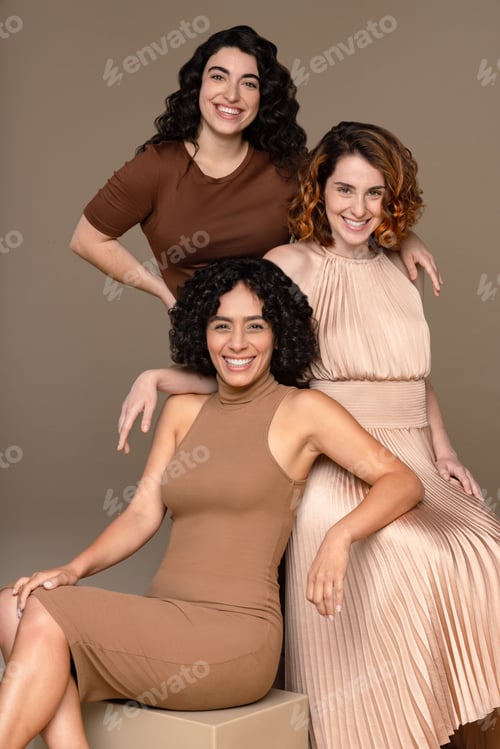 Preview: Studio Shot Of A Multiracial Woman In Her 20'S, A Middle Eastern Woman In Her 30'S, And A Caucasian