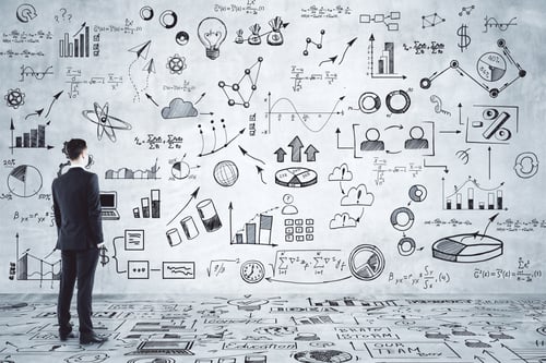 Preview: Businessman In Concrete Interior Looking At Business Sketch. Startup And Finance Concept