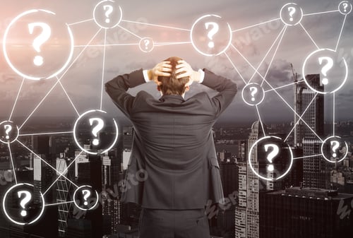 Preview: Back View Of Worried Businessman On City Background With Connected Question Marks. Faq Concept