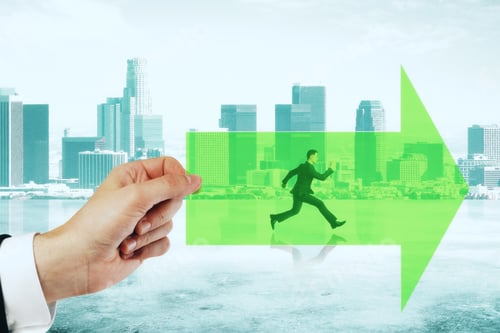 Preview: Hand Holding Green Arrow With Running Businessman On City Background. Growth And Forward Concept