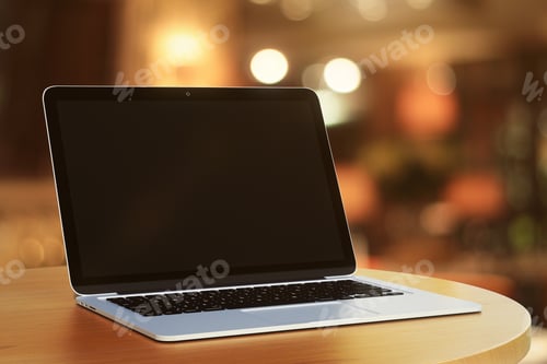 Preview: Blank Laptop In A Cafe At Evening