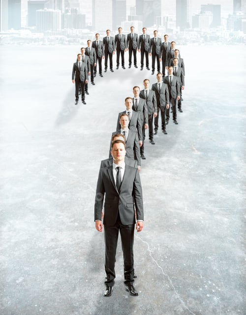 Preview: Question Mark Made Of Businessmen On Concrete City Background