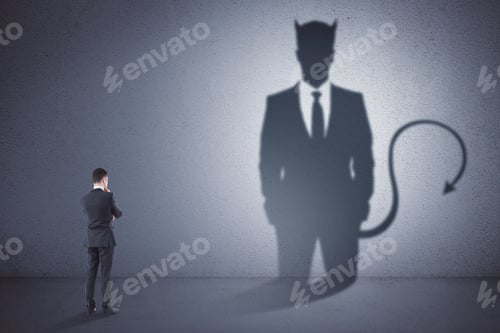 Preview: Attractive Thoughtful Young European Man With Devil Shadow Standing In Empty Concrete Interior