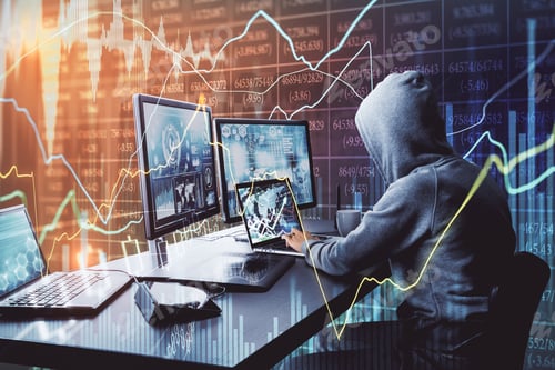 Preview: Side View Of Unrecognizable Hacker At Desktop Using Computers With Forex Chart On Blurry Office