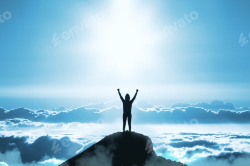 Preview: Back View Of Young Backlit Person Standing On Mountain Top On Blue Sky With Clouds Background