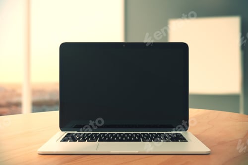 Preview: Blank Black Laptop Screen On Wooden Table At Empty Office Background, Mock Up