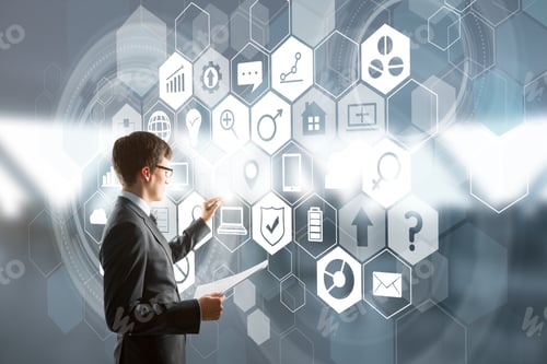 Preview: Side View Of Handsome Young European Businessman Drawing Glowing Business Interface On Blurry