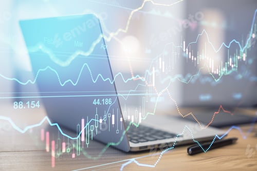 Preview: Online Stock Market Concept With Transparent Digital Screen With Financial Graphs And Opened Laptop