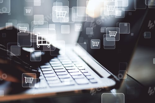 Preview: Hand Using Laptop And Makes Purchases On The Internet. Business And Online Shopping Concept