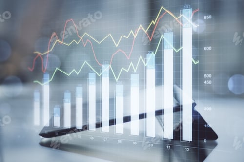 Preview: Digital Tablet Computer On Desktop With Glowing Business Chart Hologram On Blurry Background
