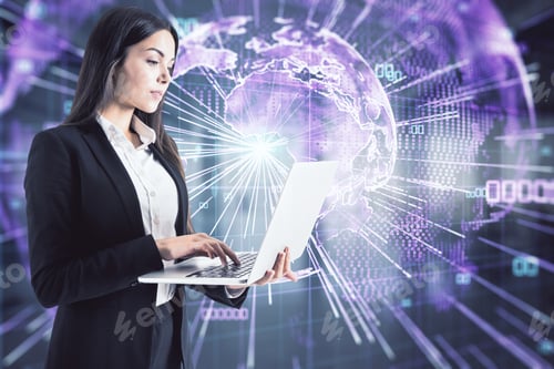 Preview: Portrait Of Attractive Young European Businesswoman Using Laptop While Standing In Blurry Office
