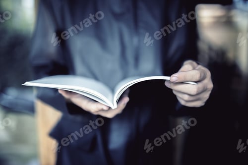Preview: Girl In Black Coat With Notepad
