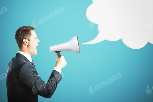 Preview: Side View Of Handsome Young Businessman Screaming Into Megaphone On Blue Background With Empty