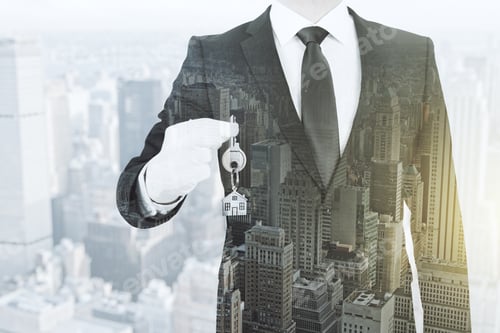 Preview: Businessman Holding Key With House Keychain On Abstract City Background. Mortgage And Housing