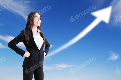 Preview: Happy Businesswoman Standing With An Arrow Up In The Background With Clear Sky, Success And