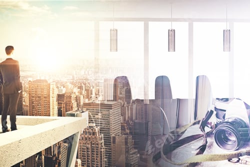 Preview: Back View Of Businessman Standing On Rooftop. Abstract City Background With Sunlight, Camera And