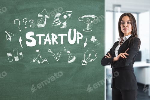 Preview: Attractive Young Businesswoman Standing In Office Interior With Startup Sketch On Chalkboard. Start