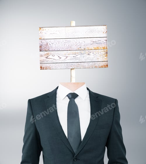 Vista previa: Young Businessman Body With Wooden Signboard Instead Of Head On Grey Background. Mock Up