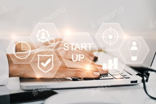 Preview: Close Up Of Female Hands Using Laptop Placed On Office Desktop With Smartphone And Abstract