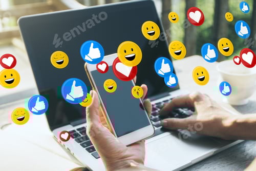 Preview: Close Up Of Female Hands Using Laptop And Smartphone On Desktop With Social Media Icons. Blurry