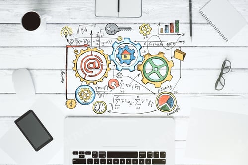 Preview: Top View Of A Wooden Desktop With Business Scheme Concept