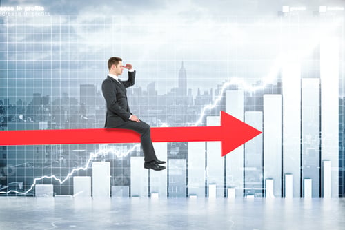 Preview: Research Concept With Businessman Sitting On Red Chart Arrow And Looking Into The Distance On City