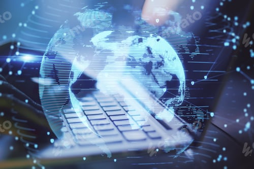 Preview: Close Up Of Hands Using Laptop With Abstract Globe Interface On Blurry Desktop Background