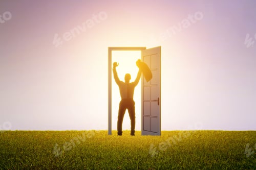 Preview: Successful Business Man Standing In Front Of Bright Door In Abstract Interior With Concrete Wall