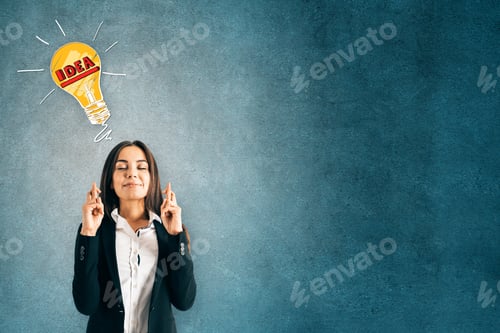 Preview: Portrait Of Attractive Young European Businesswoman With Crossed Fingers And Lamp Sketch On