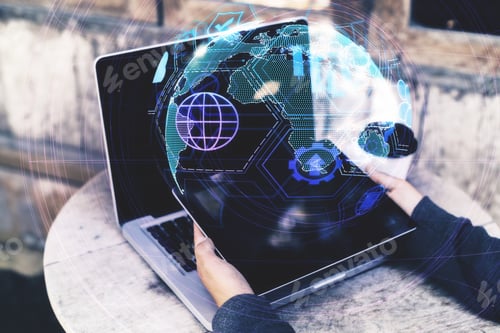 Preview: Close Up And Side View Of Hands Using Laptop With Digital Globe Interface On Blurry Background